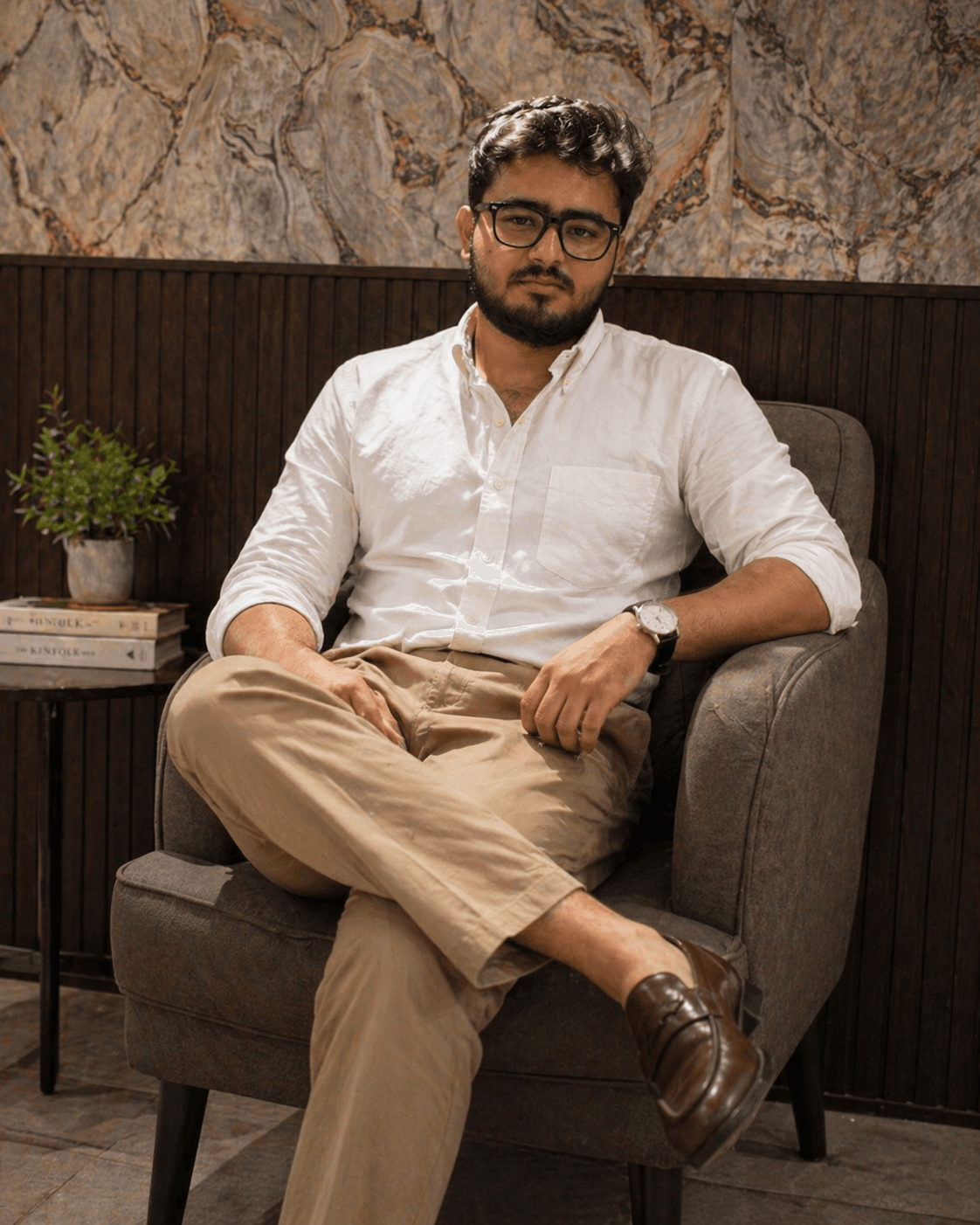 Nitin Mishra, sitting in an armchair